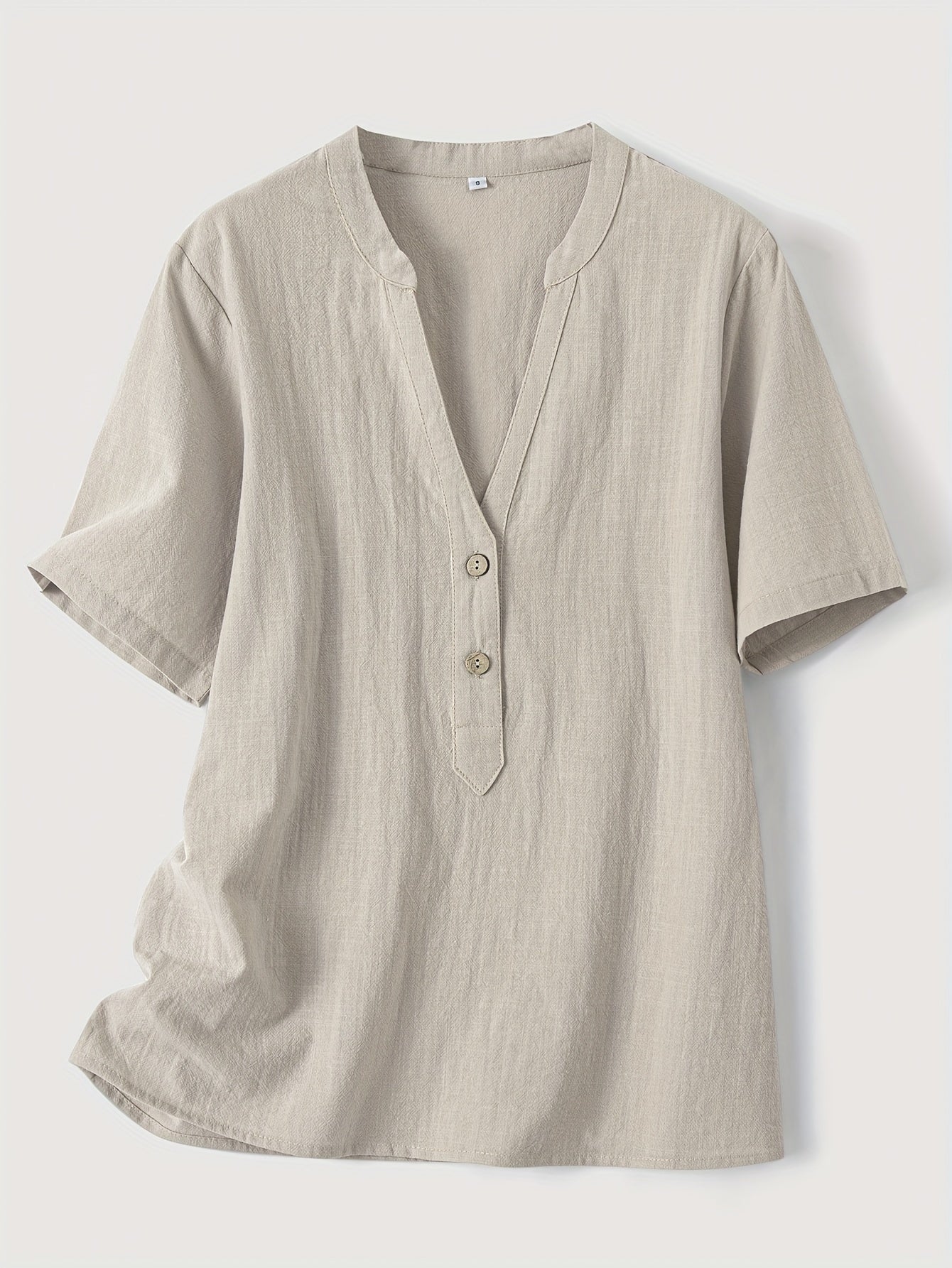 Blouse élégante à col en V et boutons en bois