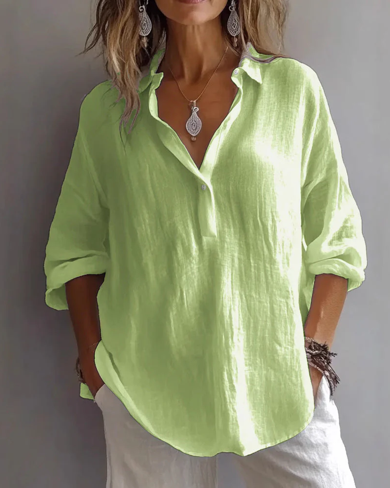 Blouse ample avec col en V et manches réglables