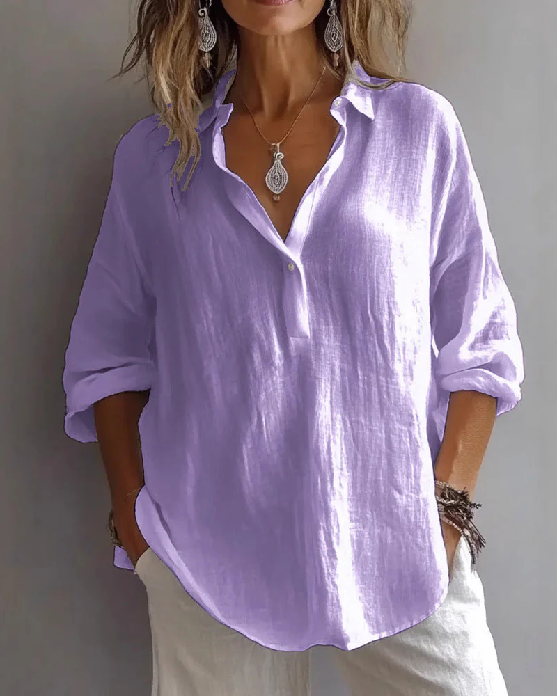 Blouse ample avec col en V et manches réglables