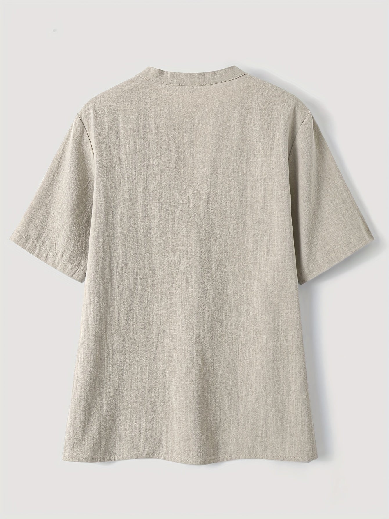 Blouse élégante à col en V et boutons en bois